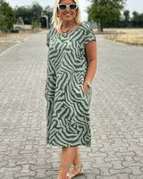 QUORINA | RELAXED MIDI DRESS WITH ROUND NECKLINE