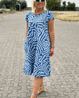 QUORINA | RELAXED MIDI DRESS WITH ROUND NECKLINE