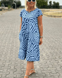 QUORINA | RELAXED MIDI DRESS WITH ROUND NECKLINE